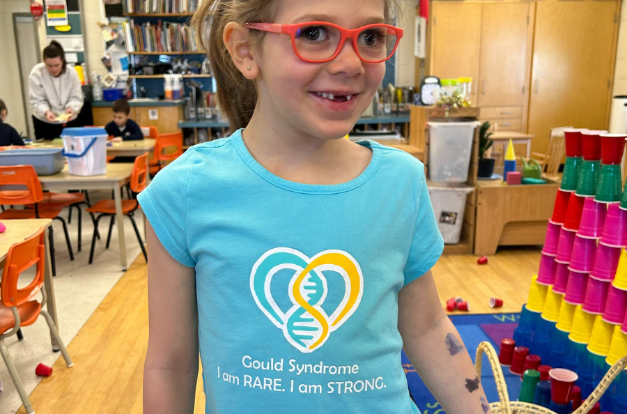 photo of Mikayla wearing a shirt that reads: "Gould Syndrome. I am RARE. I am STRONG."