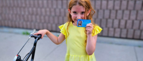 Sofia poses with her "bicycle license"