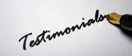 "Testimonials" written in cursive with a fountain pen.