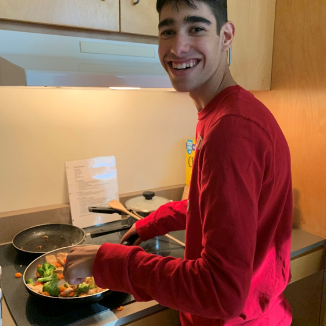 Jayden learning how to cook at the ILP