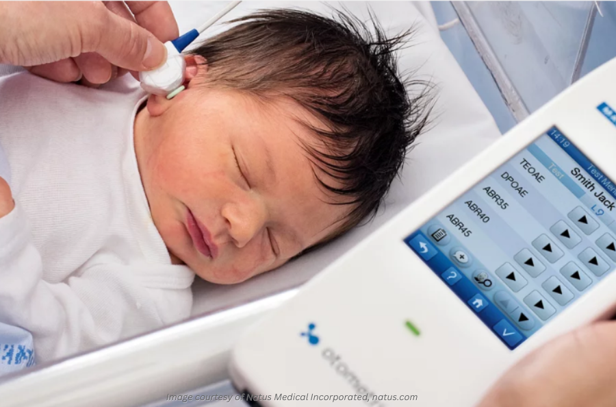 An infant getting a hearing screening using the Madsen® Accuscreen - Newborn Hearing Screener OAE/ABR