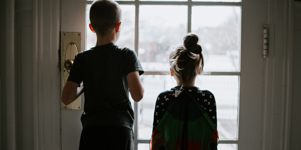 children looking out a window