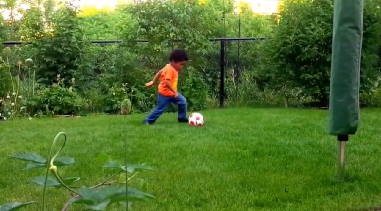 Jaisen playng soccer as a young toddler